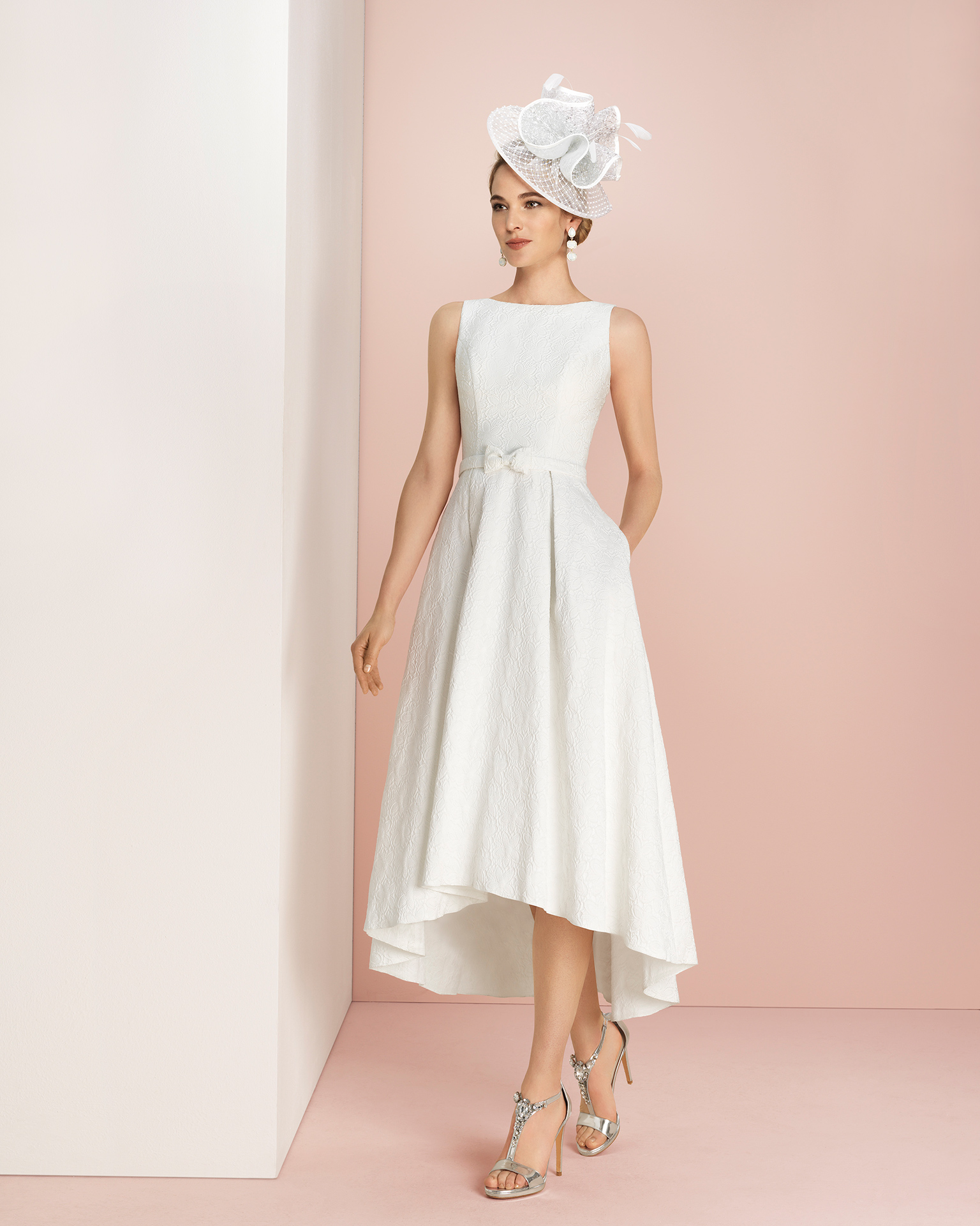 High-low brocade cocktail dress with open back. Available in coral and natural. 2018 COUTURE CLUB Collection.