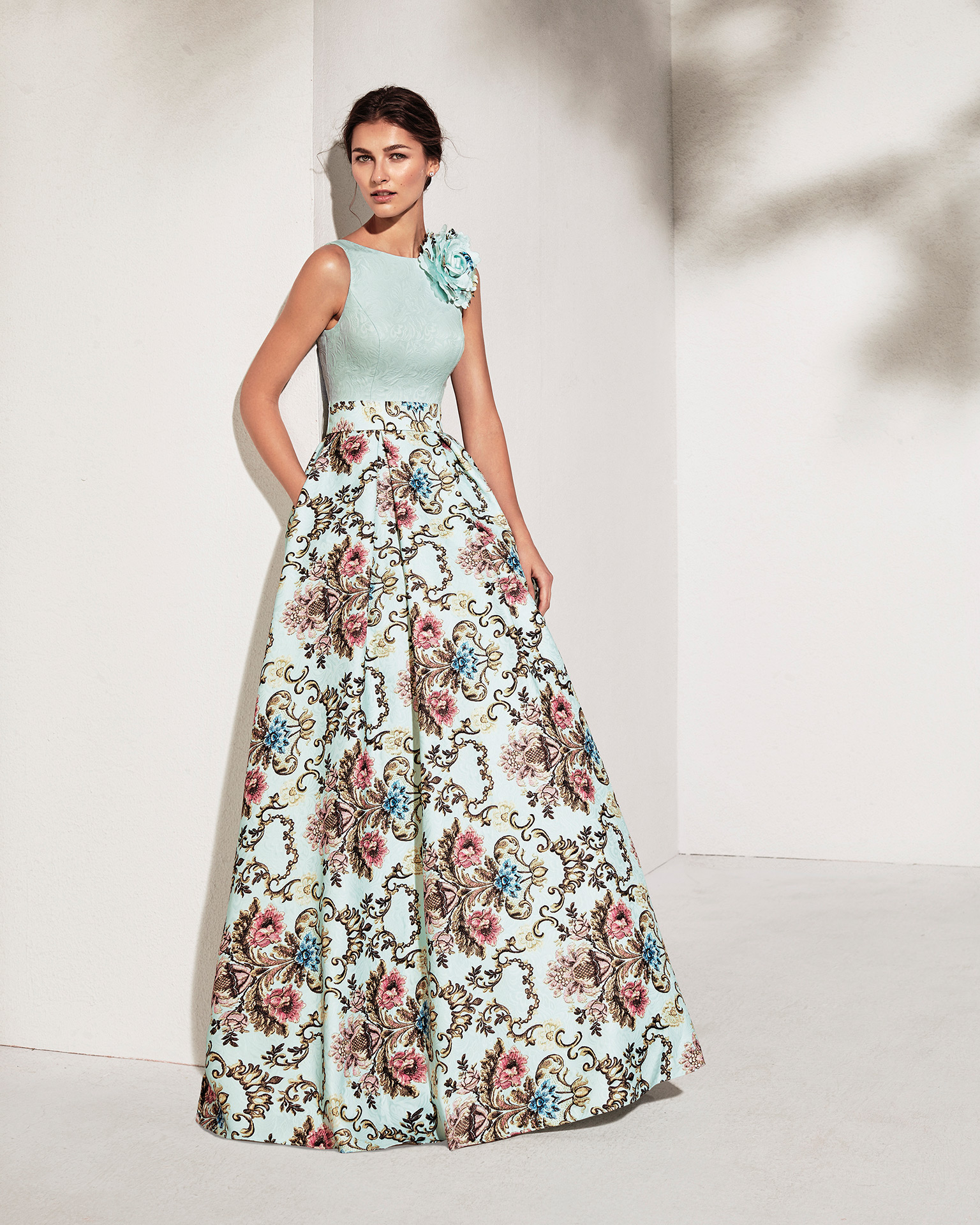 Long brocade cocktail dress, available in aquamarine. 2018 MARFIL BARCELONA Collection.