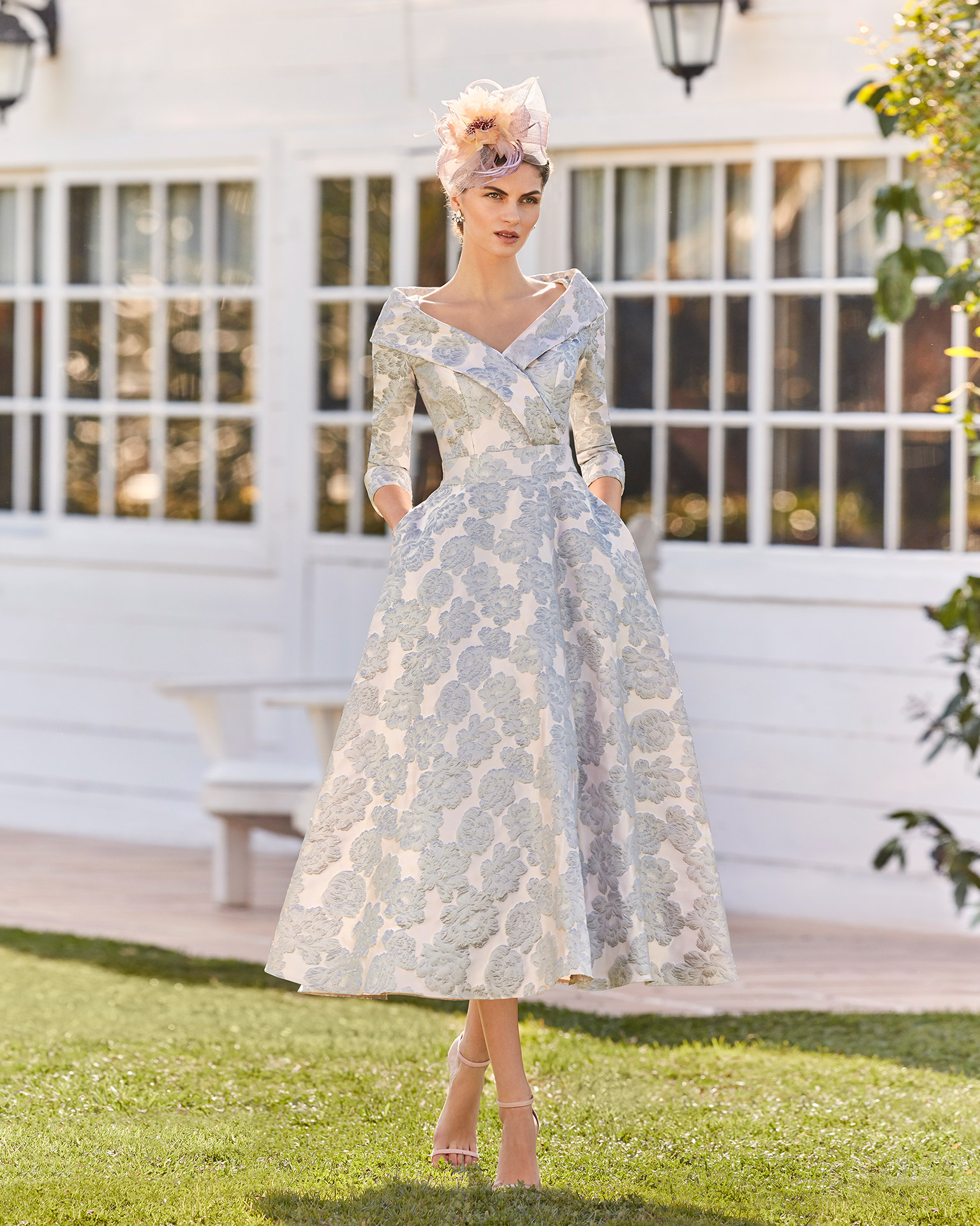 Brocade cocktail dress. Off-the-shoulder crossover neckline with three-quarter sleeves. 2021 COUTURE CLUB Collection.