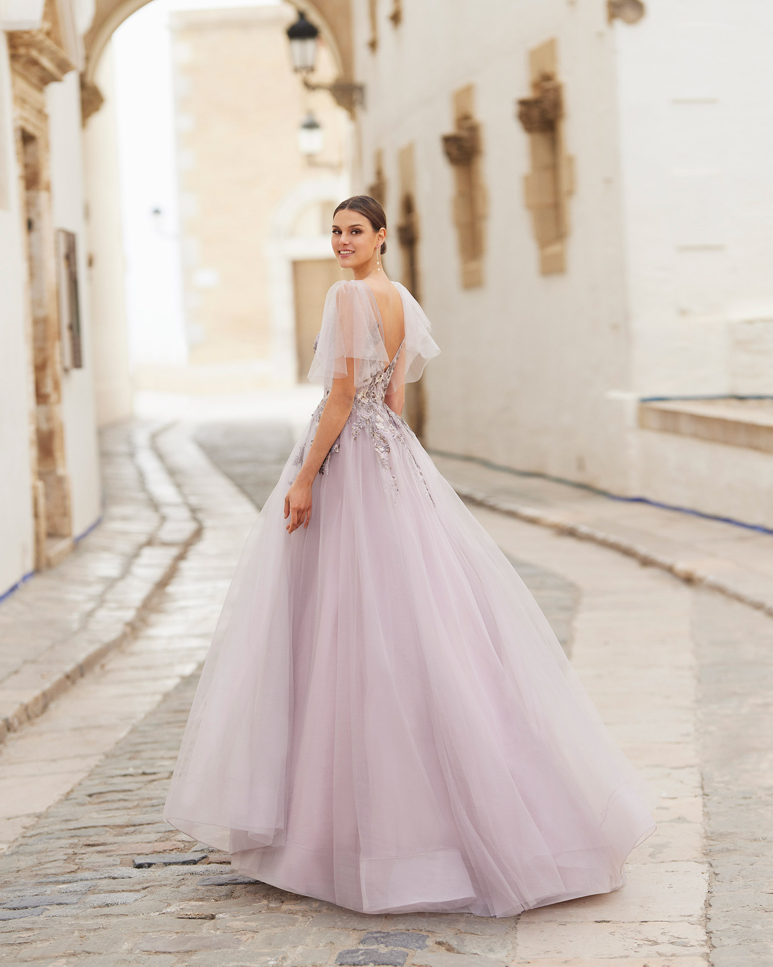 Beaded lace and tulle cocktail dress.  Bateau neckline and V-back. With tulle drapes. 2022 MARFIL_BARCELONA Collection.