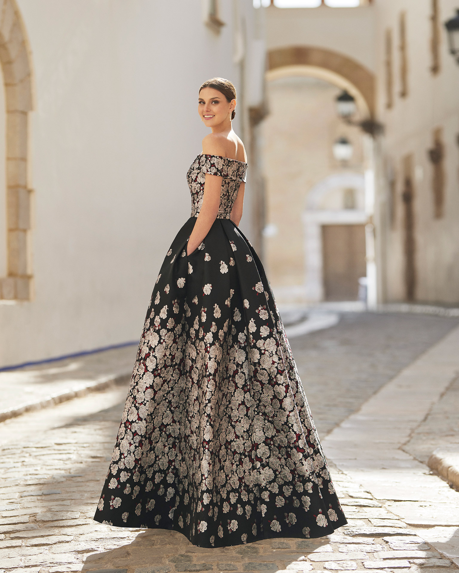 Brocade cocktail dress. Off-the-shoulder neckline and low back. With shawl. 2022 MARFIL_BARCELONA Collection.