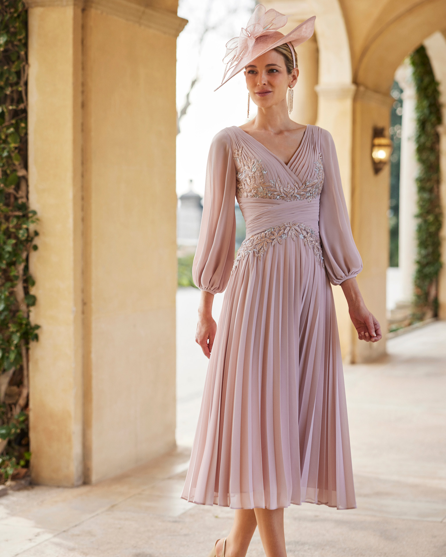 Flowing midi guest dress. Crafted with georgette combined with beadwork lace. With V-neckline and V-back with puffed sleeves. Couture Club outfit. MARFIL_BARCELONA.