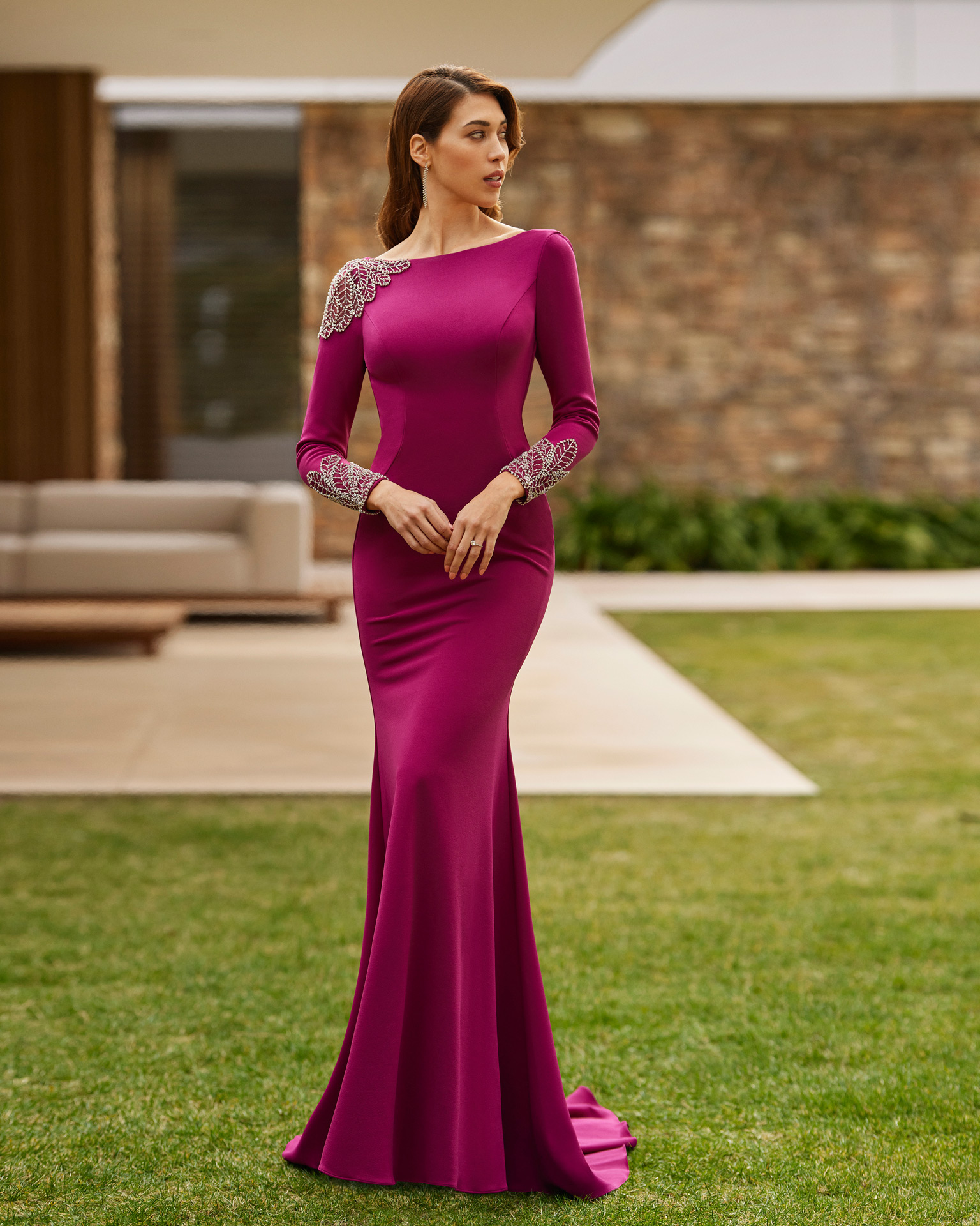 Elegant long evening dress. Made with crêpe embellished with beadwork. With round neckline and plunging back, and long sleeves with beadwork. Marfil Barcelona dreamy look. MARFIL_BARCELONA.