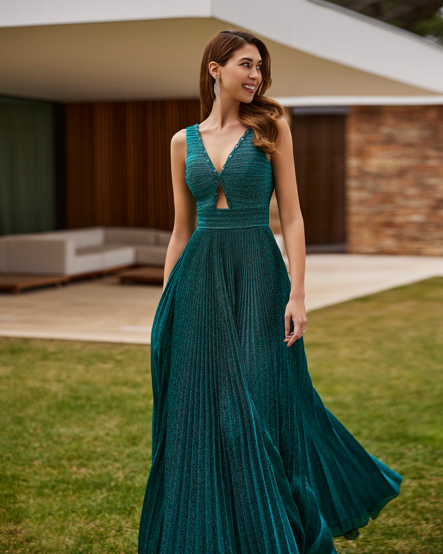 Flowing long cocktail dress. Made with lurex with beadwork details. With V-neckline and V-back. Marfil Barcelona design for parties and events. MARFIL_BARCELONA.