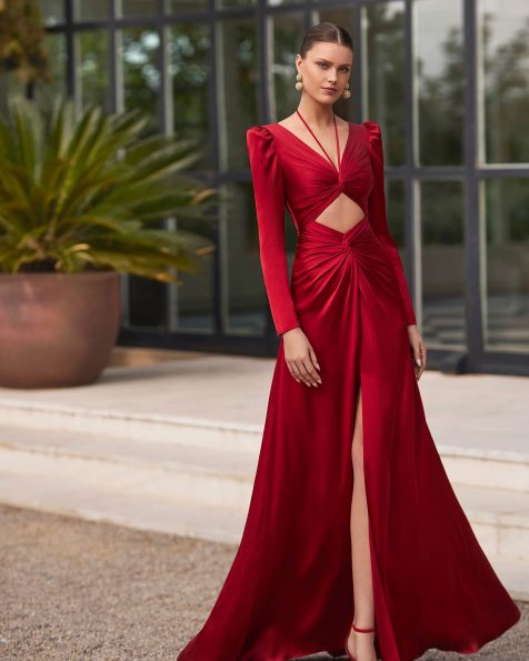 Long evening dress crafted in satin cloque. Featuring a V-neckline and V-back, long sleeve and cut-out embellishment. A Marfil Barcelona look. MARFIL_BARCELONA.