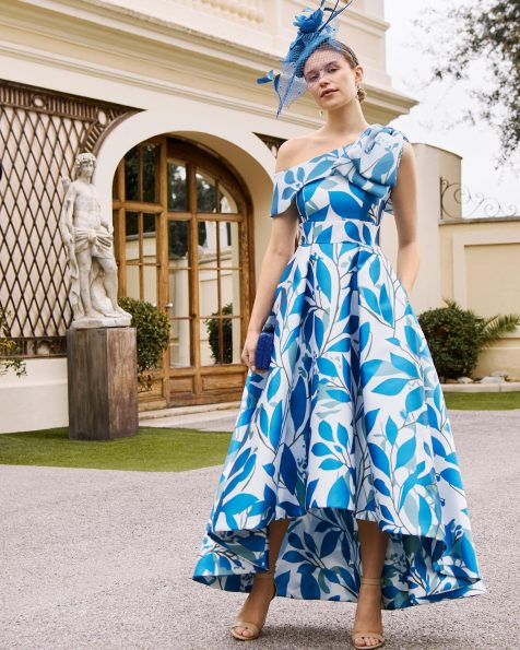 Midi evening dress made of mikado. Featuring a strapless neckline. MARFIL_BARCELONA.