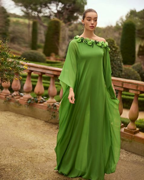 Long party jumpsuit. Made of chiffon. V-neckline with outer dress. Floral details. MARFIL_BARCELONA.